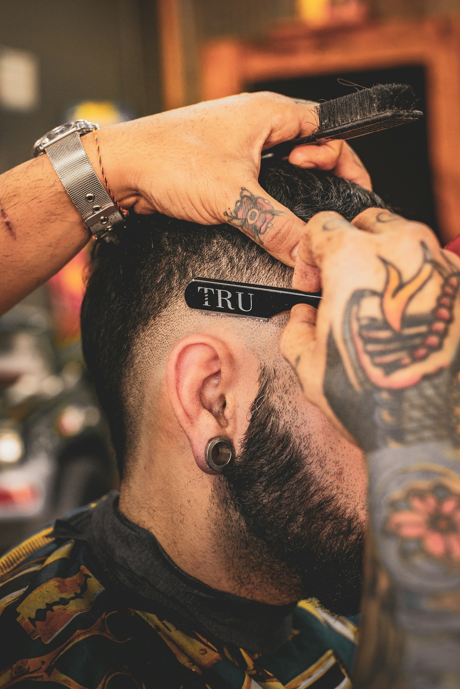 Side profile of a modern fade haircut